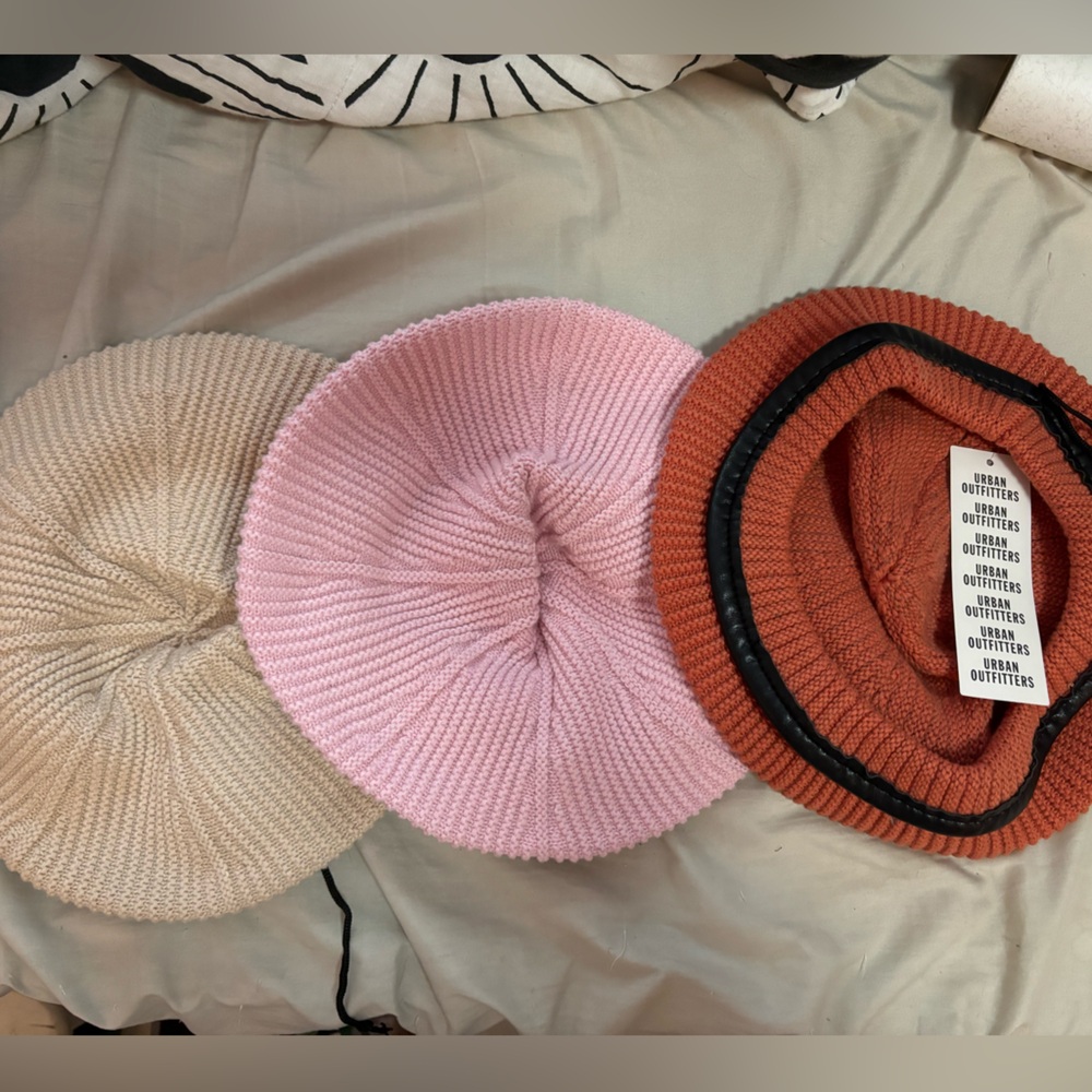 3 berets from urban outfitters. Khaki, pink, burnt orange